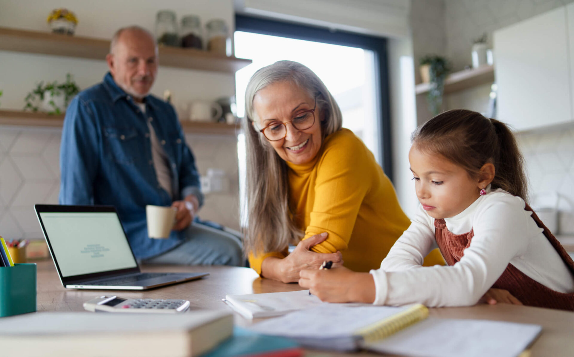 Kinship parents helping child with school work